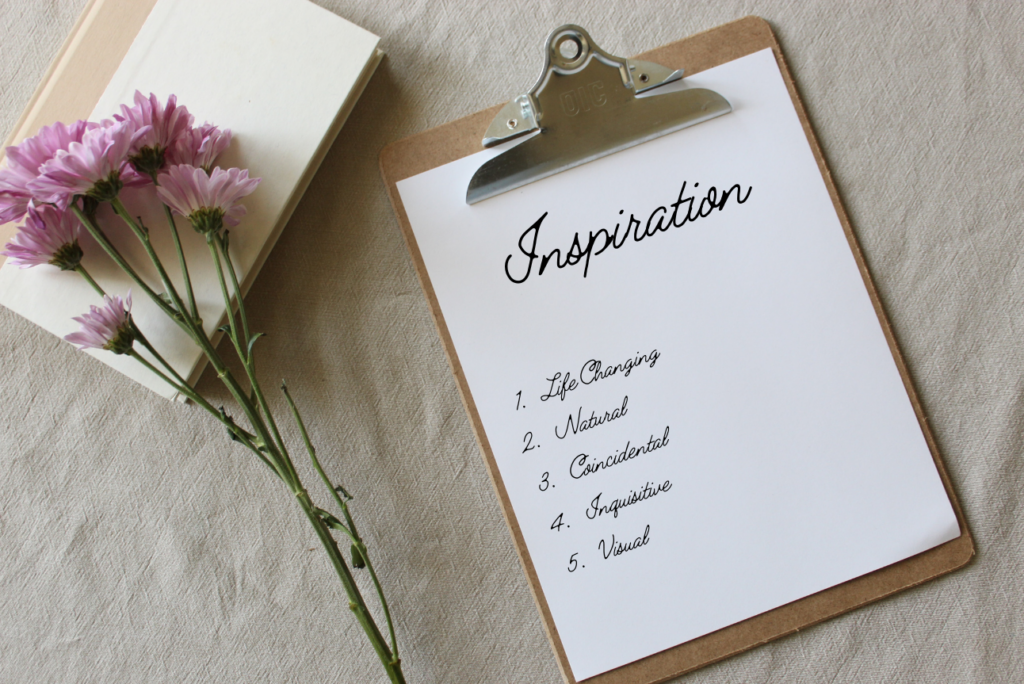A clipboard listing the sources of Inspiration. The words Life changing, natural, coincidental, inquisitive and visual are written on the page. 